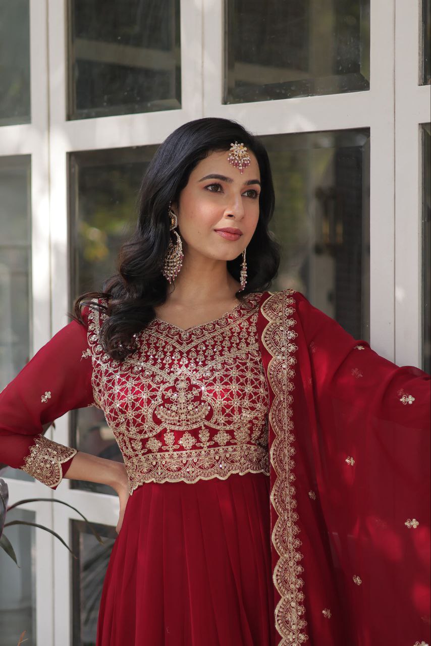 Party Wear Maroon Color Faux Blooming With Embroidery Zari Sequins Work Designer Gown