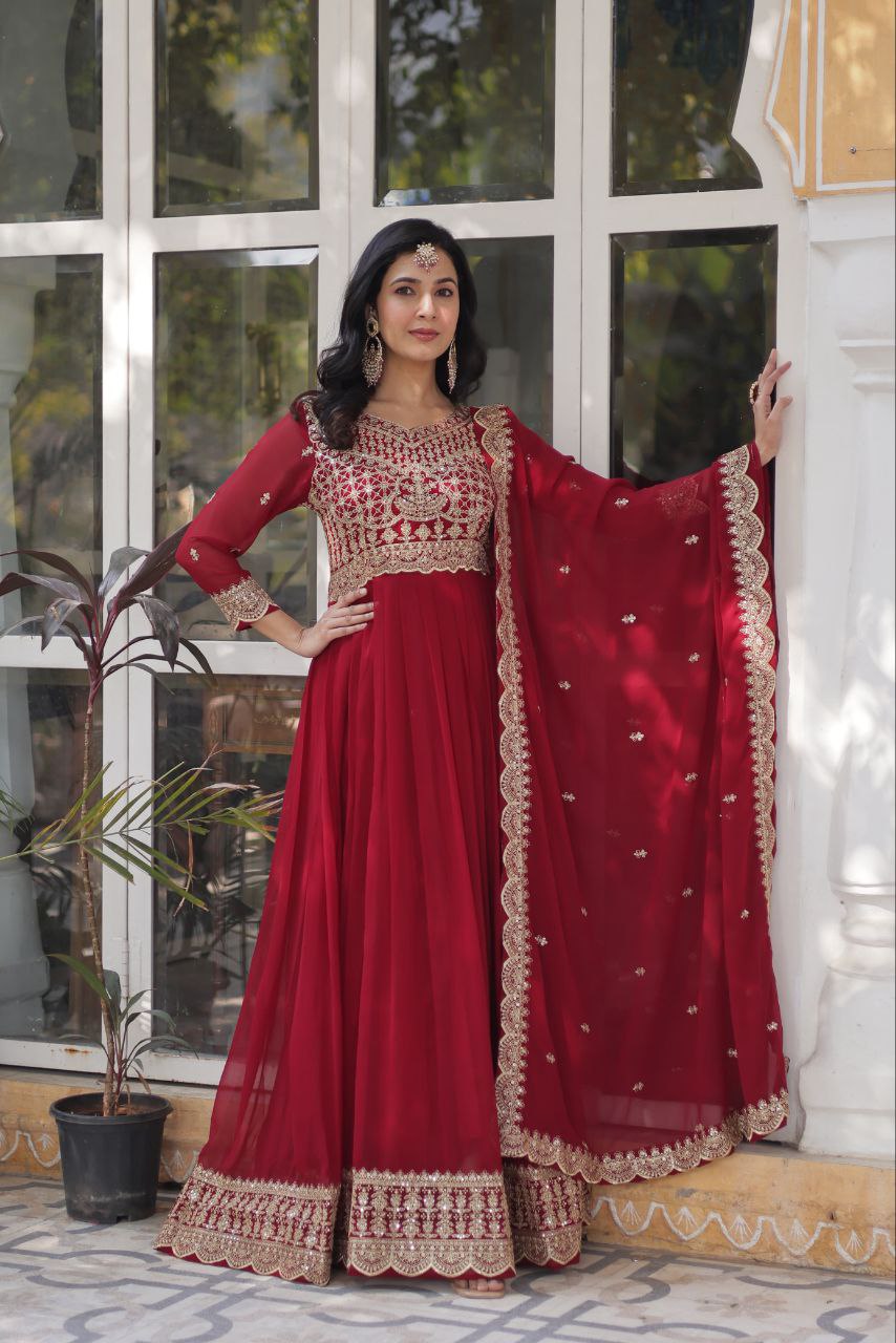 Party Wear Maroon Color Faux Blooming With Embroidery Zari Sequins Work Designer Gown