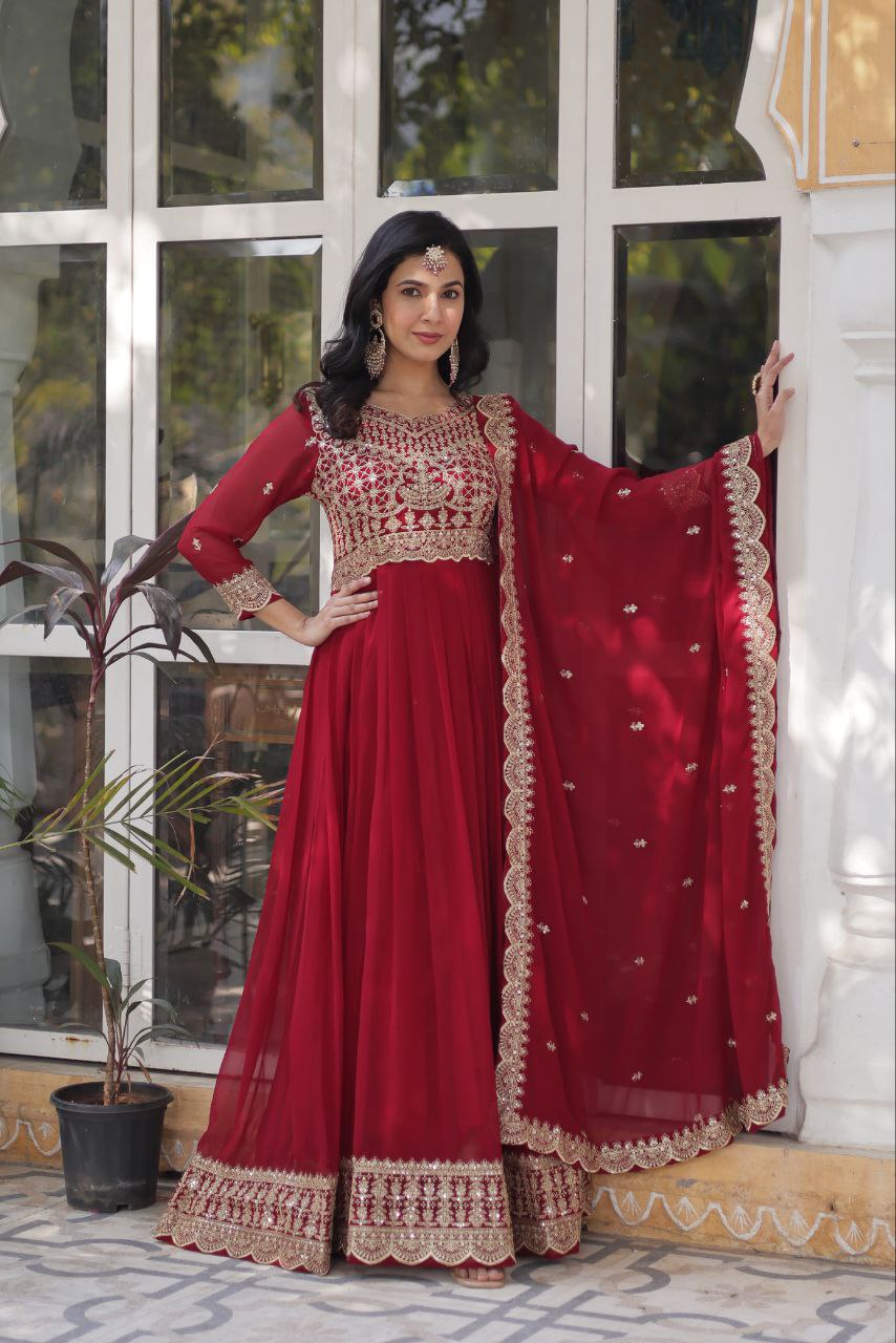 Party Wear Maroon Color Faux Blooming With Embroidery Zari Sequins Work Designer Gown