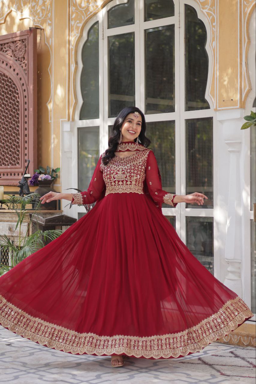 Party Wear Maroon Color Faux Blooming With Embroidery Zari Sequins Work Designer Gown