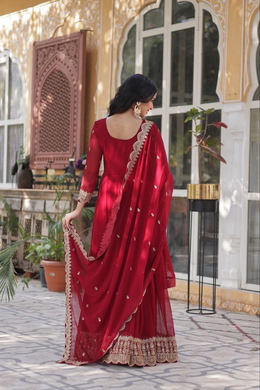 Party Wear Maroon Color Faux Blooming With Embroidery Zari Sequins Work Designer Gown