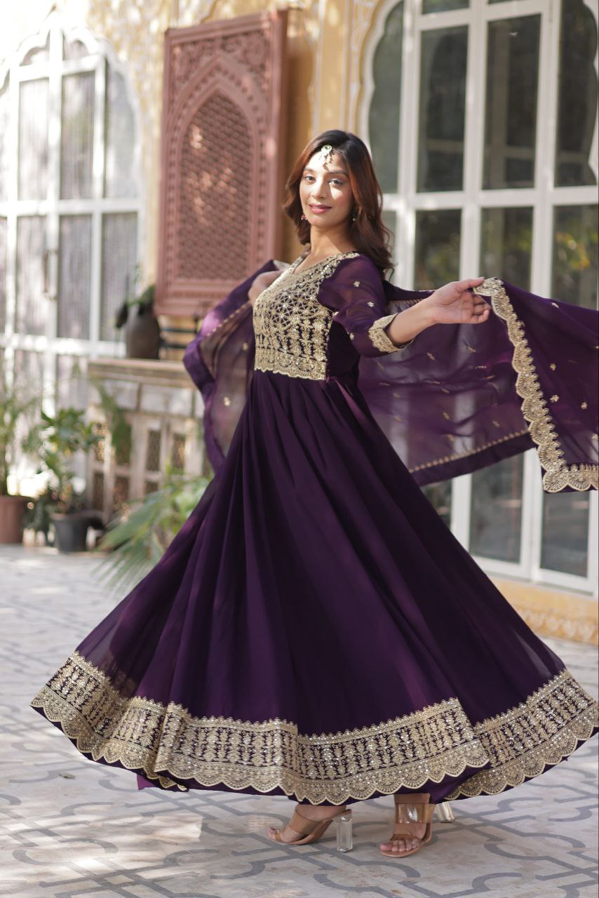 Party Wear Purple Color Faux Blooming With Embroidery Zari Sequins Work Designer Gown