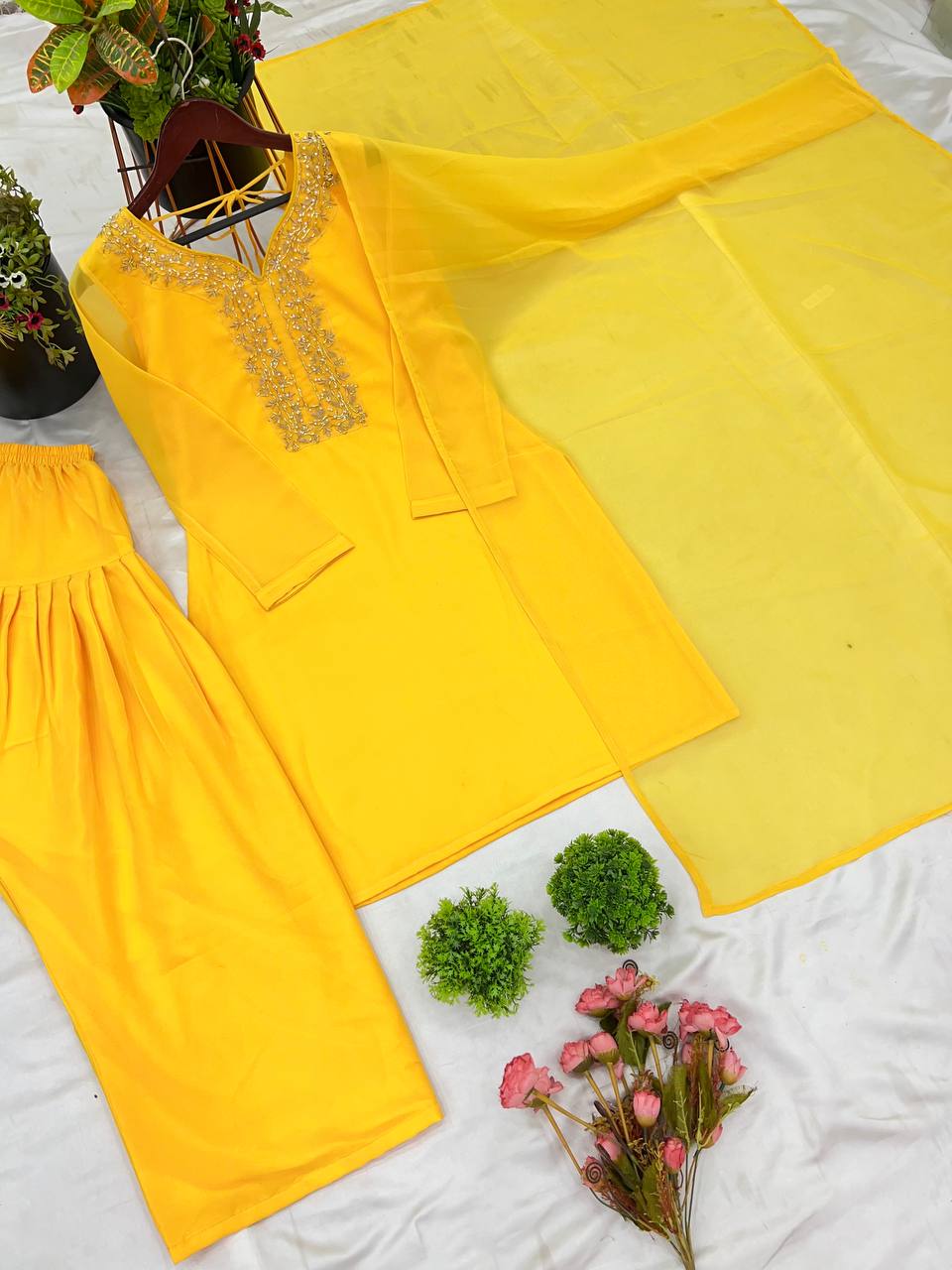 Stylish Yellow Color Faux Georgette And Embroidery With Hand work And Beads Salwar Suit