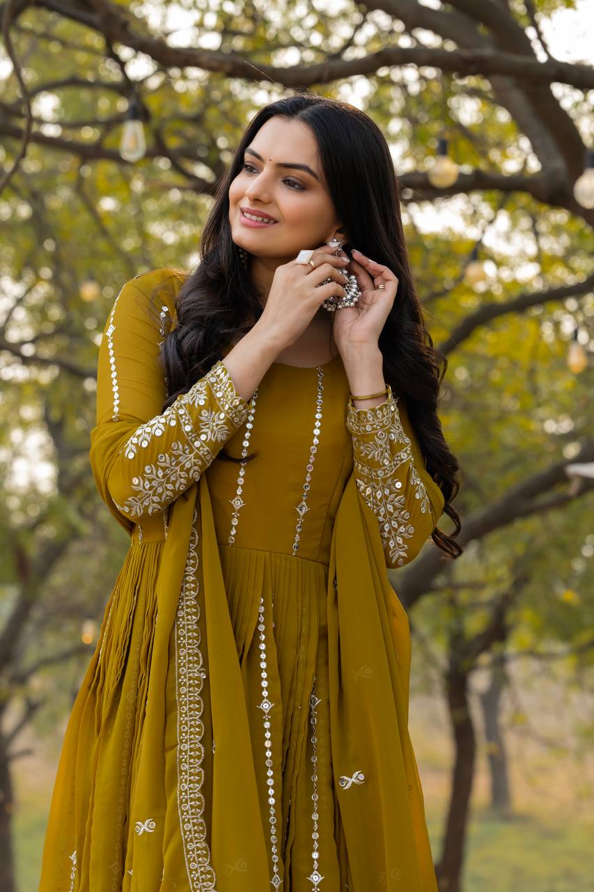 Gorgeous Mahendi Green Color Faux Georgette With Sequence Embroidery Work Beautiful Gown
