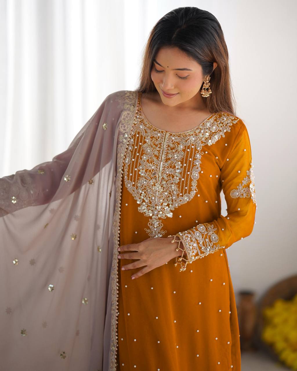 Reception Wear Mustard Color Heavy Faux Georgette With Heavy Embroidery Work Palazzo Suit