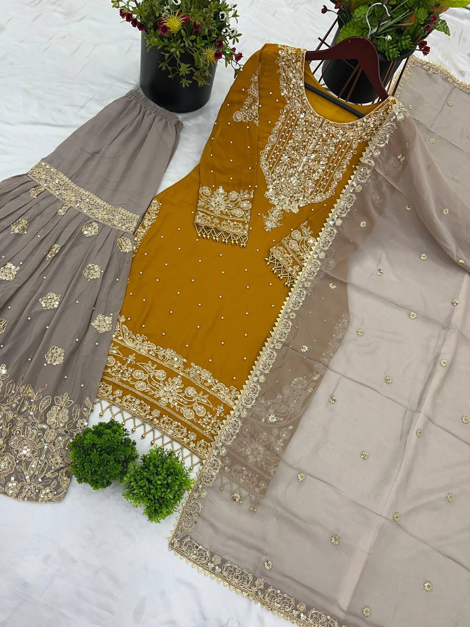 Reception Wear Mustard Color Heavy Faux Georgette With Heavy Embroidery Work Palazzo Suit