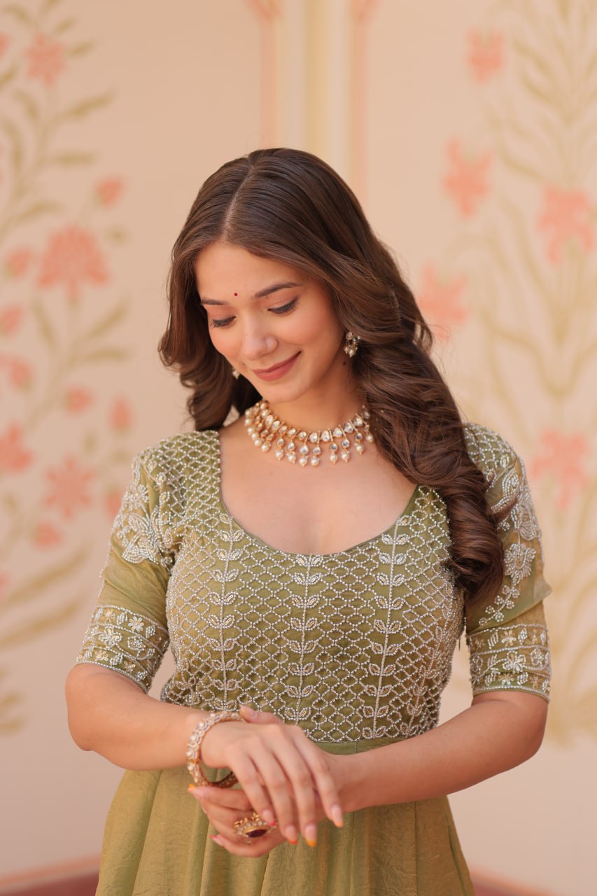 Admiring Mahendi Color Fendy With Beads Embroidered Work Gown