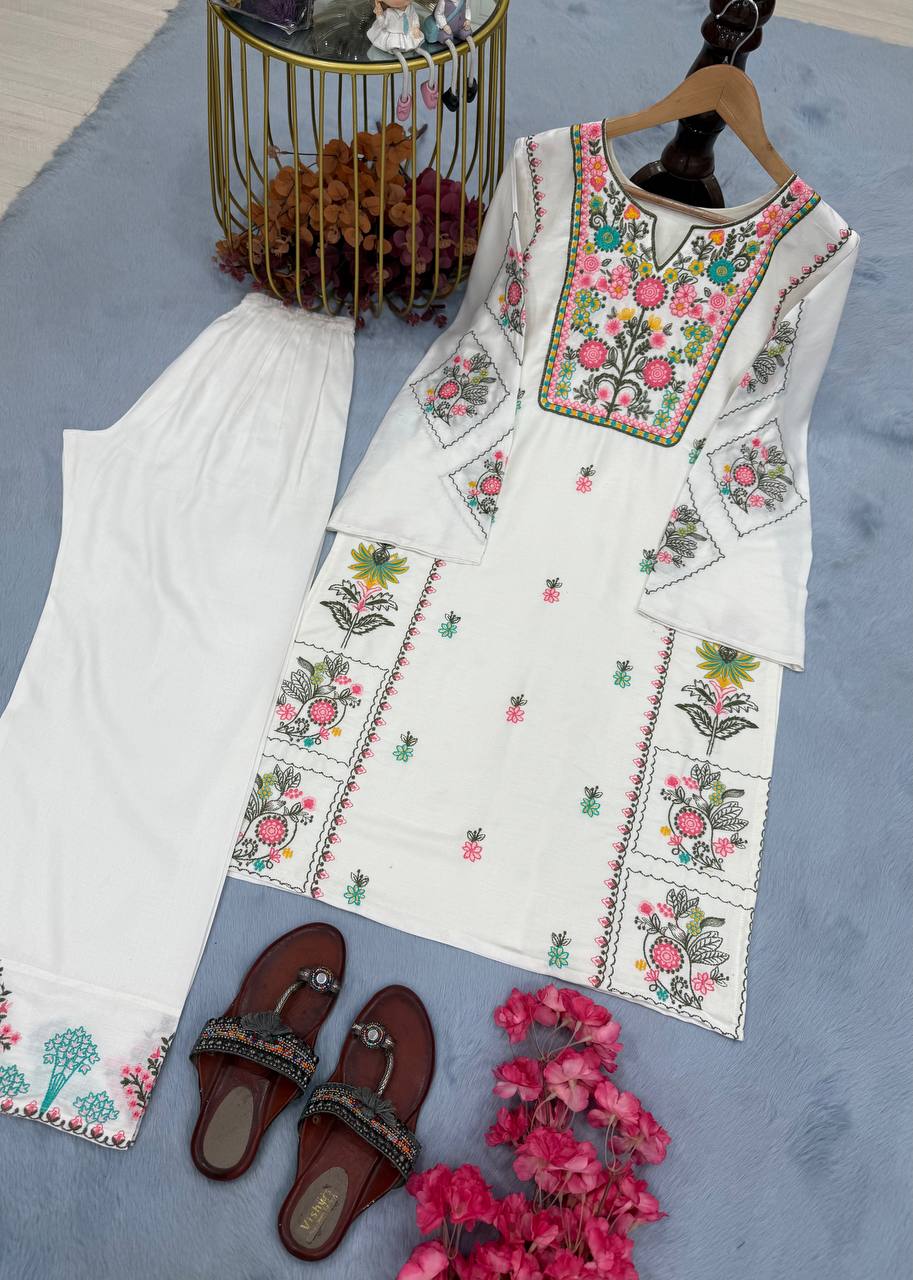 Presenting White Color Heavy Rayon Silk With Heavy Embroidery Work Palazzo Suit
