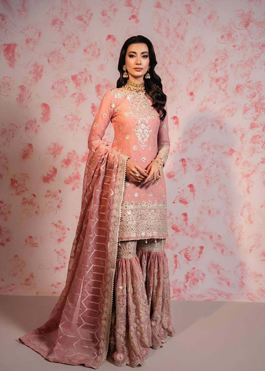 Luxuriant Peach Color Heavy Faux Georgette With Embroidery Sequence Work Sharara Suit