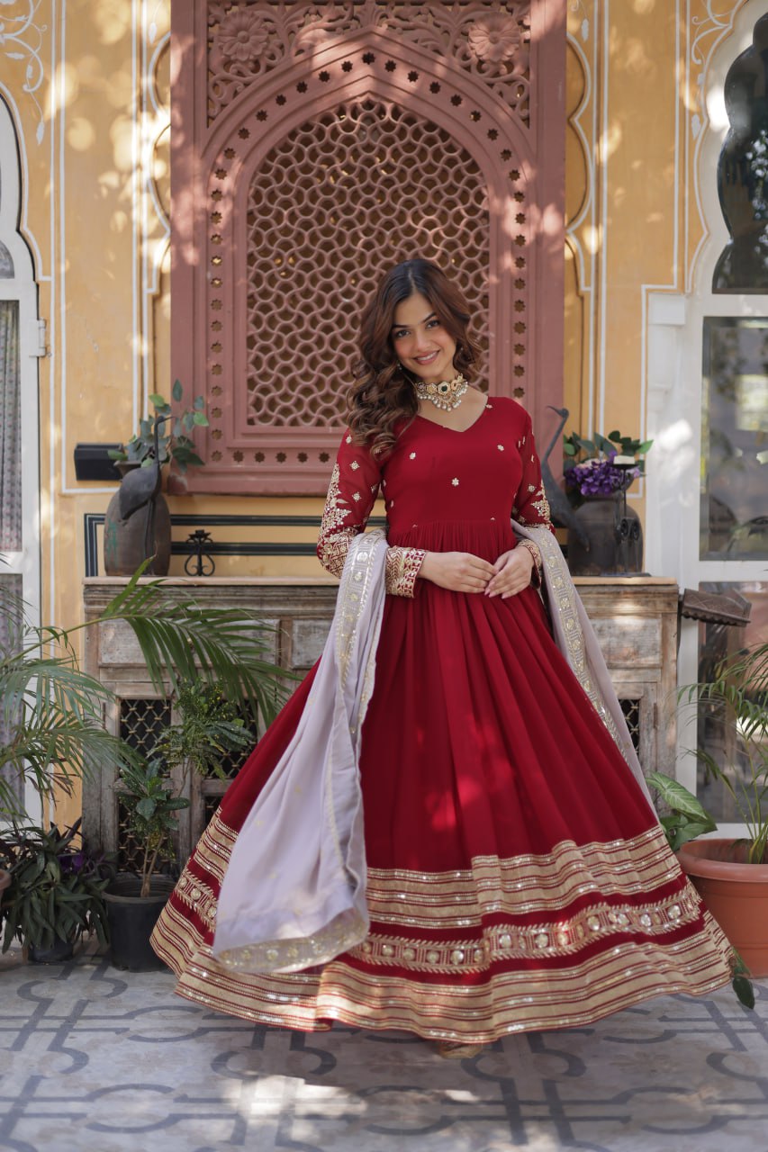Captivating Maroon Color Faux Blooming With Embroidery Zari Sequins Work Designer Gown