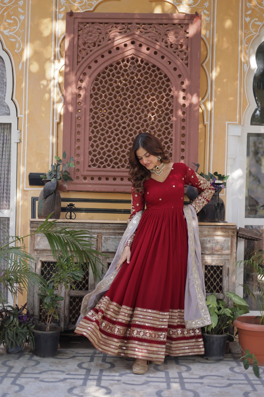 Captivating Maroon Color Faux Blooming With Embroidery Zari Sequins Work Designer Gown
