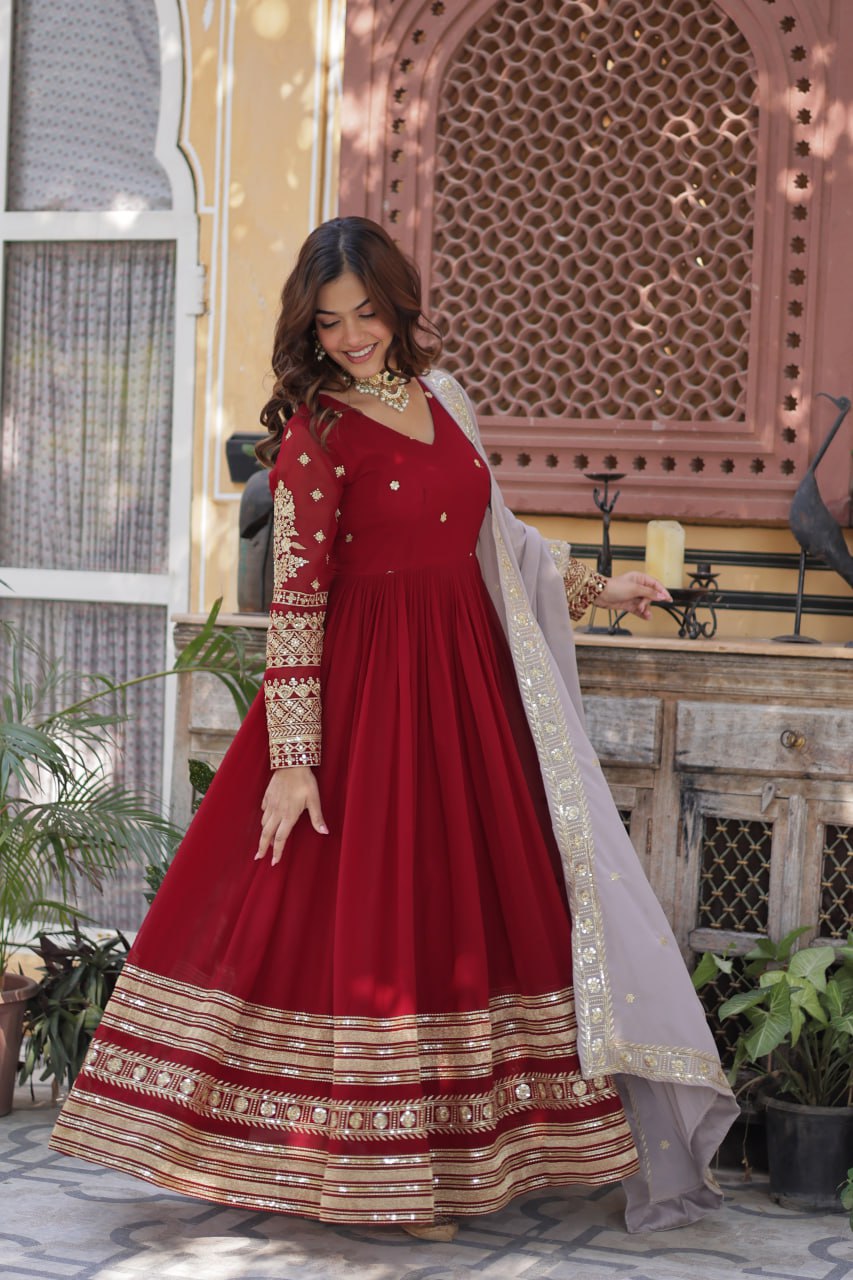 Captivating Maroon Color Faux Blooming With Embroidery Zari Sequins Work Designer Gown