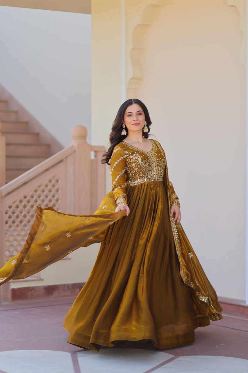 Festive Wear Mahendi Color Zari And Sequins Embroidered Work Designer Gown