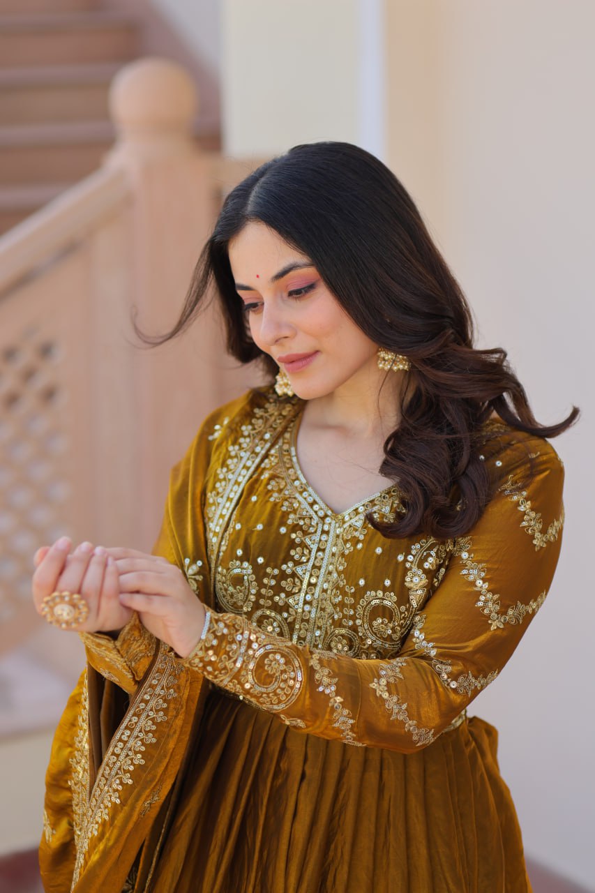 Festive Wear Mahendi Color Zari And Sequins Embroidered Work Designer Gown