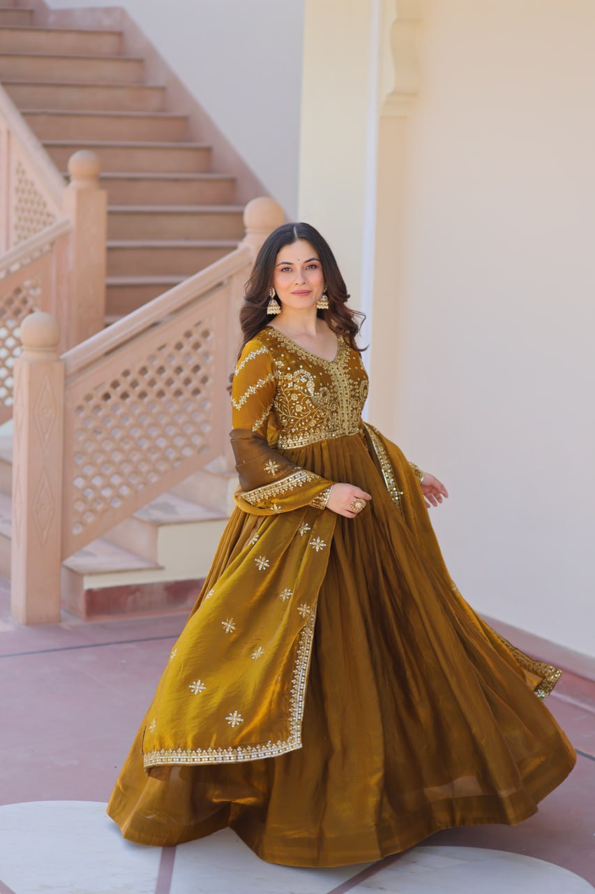 Festive Wear Mahendi Color Zari And Sequins Embroidered Work Designer Gown