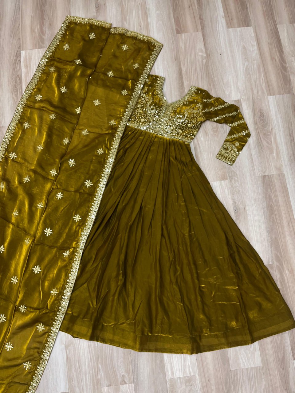 Festive Wear Mahendi Color Zari And Sequins Embroidered Work Designer Gown