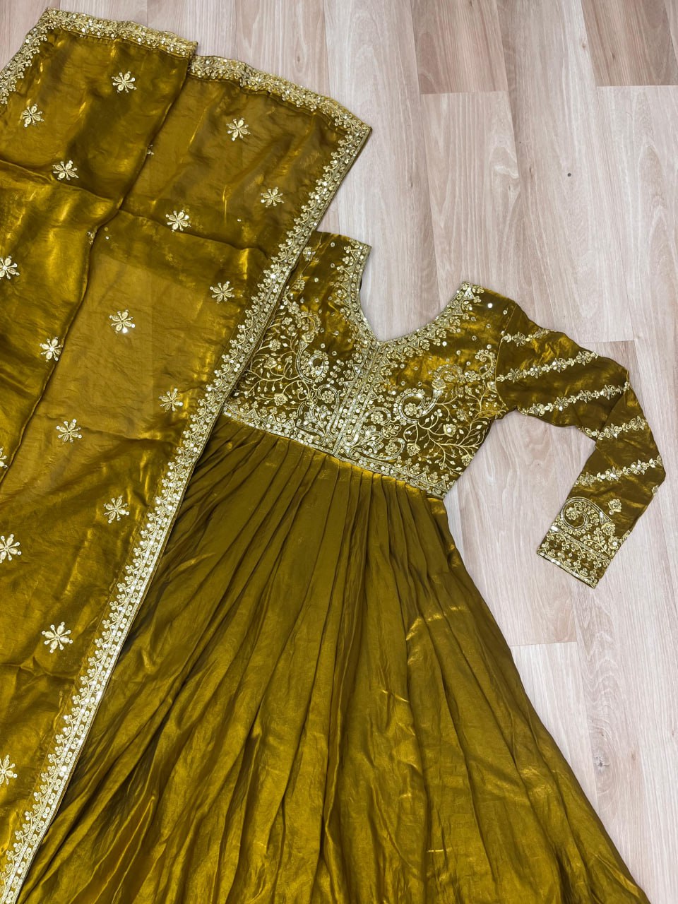 Festive Wear Mahendi Color Zari And Sequins Embroidered Work Designer Gown