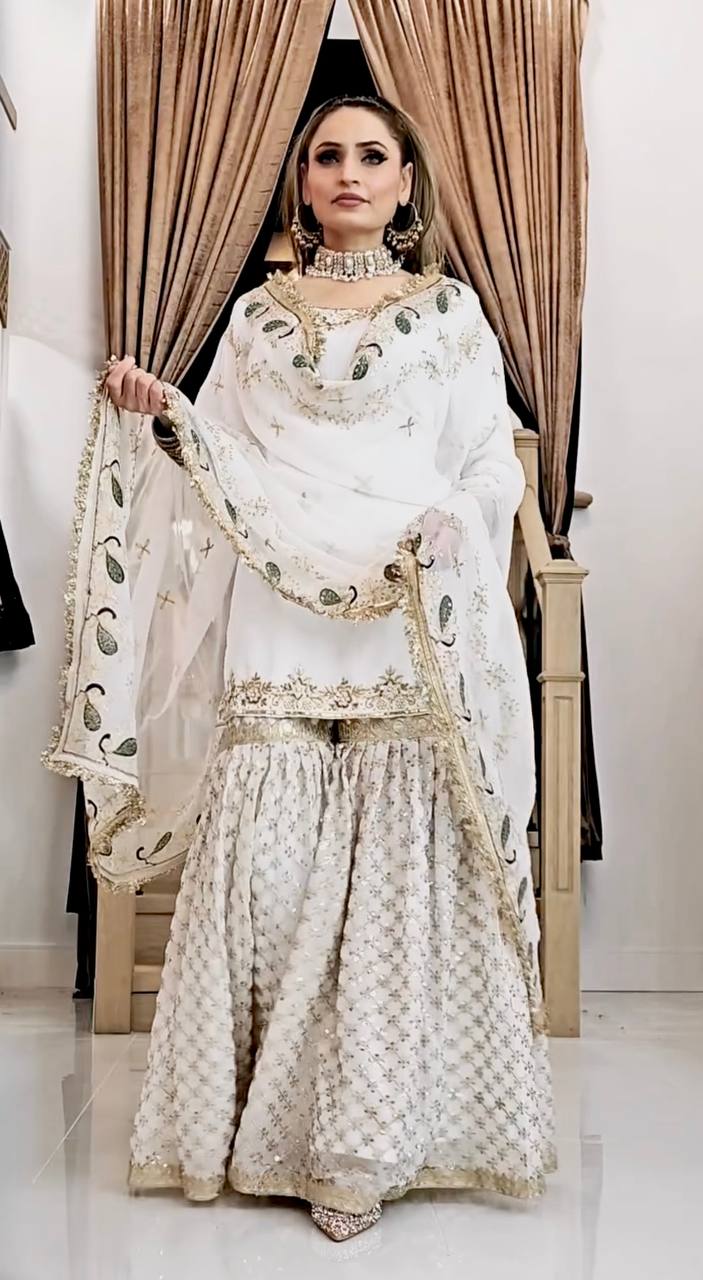 Ceremony Wear Off White Color Faux Georgette With Embroidery Sequence Work Sharara Suit