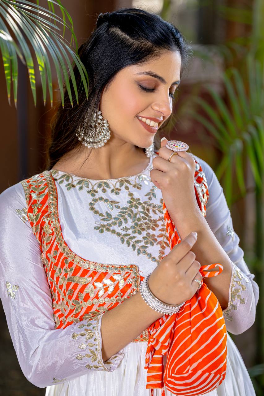Ceremony Wear Off White Color Pure Chinon With Laheriya Printed Beautiful Gown