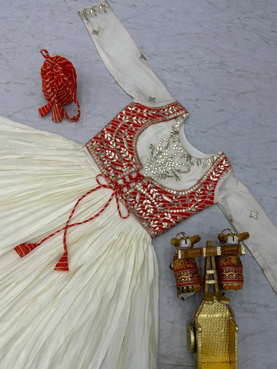 Ceremony Wear Off White Color Pure Chinon With Laheriya Printed Beautiful Gown