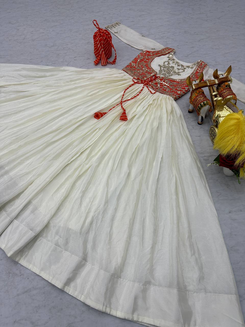 Ceremony Wear Off White Color Pure Chinon With Laheriya Printed Beautiful Gown