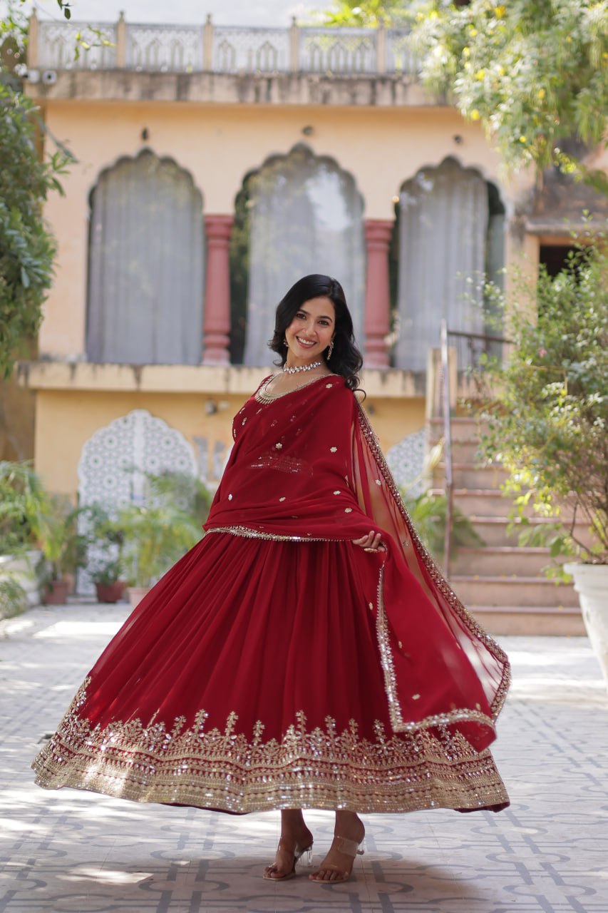 Graceful Maroon Color Faux Blooming With Embroidery Zari Sequins Work Designer Gown