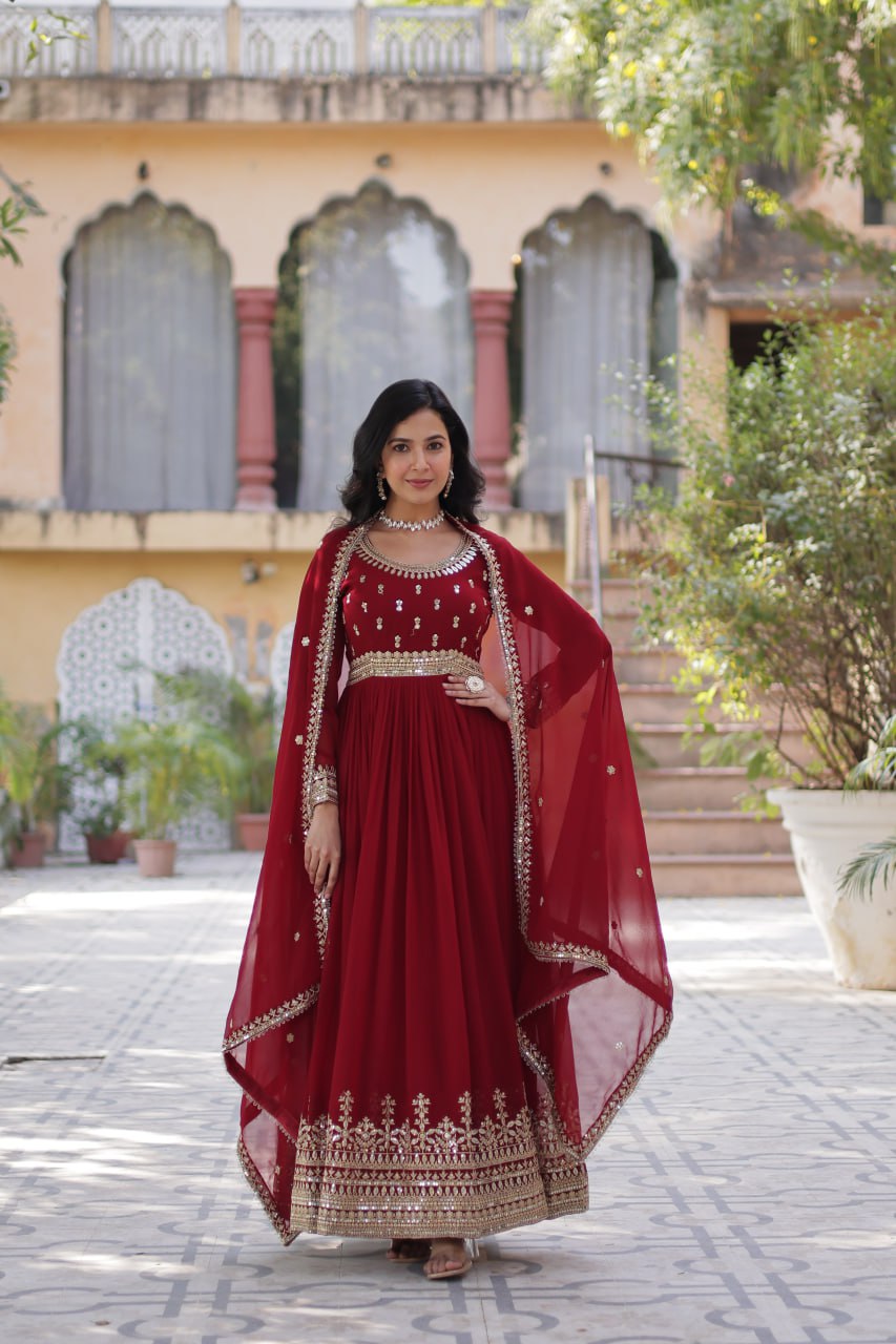 Graceful Maroon Color Faux Blooming With Embroidery Zari Sequins Work Designer Gown