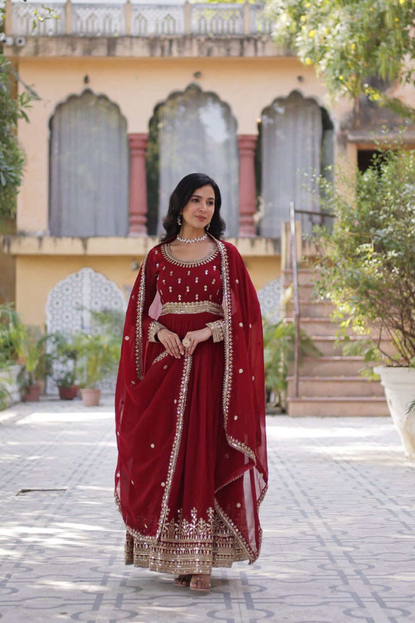 Graceful Maroon Color Faux Blooming With Embroidery Zari Sequins Work Designer Gown