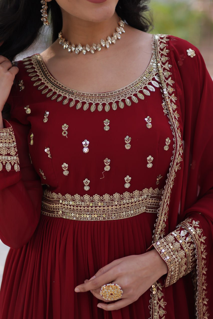 Graceful Maroon Color Faux Blooming With Embroidery Zari Sequins Work Designer Gown