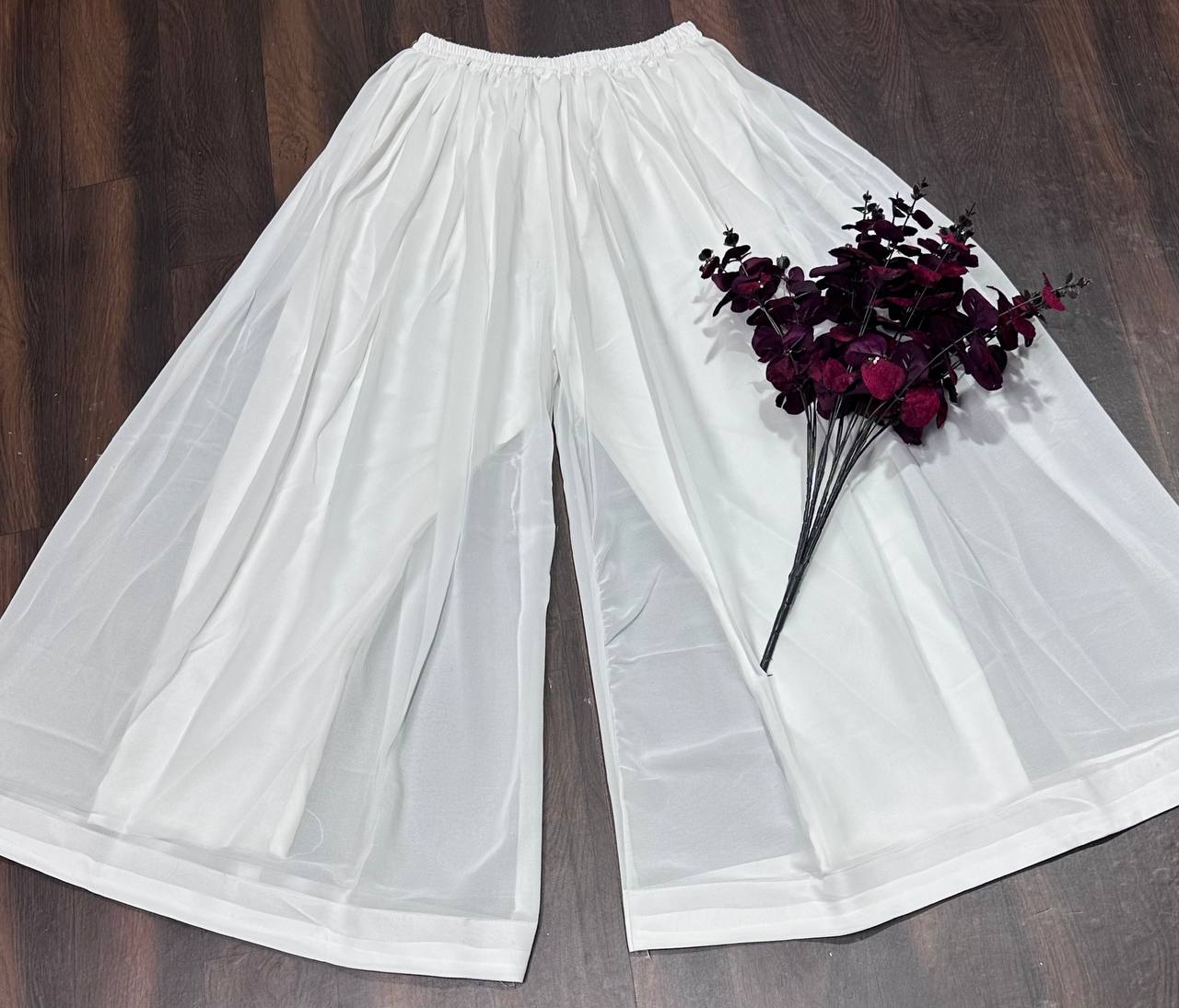 Gorgeous White Color Faux Blooming With Heavy Sequins And Thread Embroidered Work Palazzo Suit