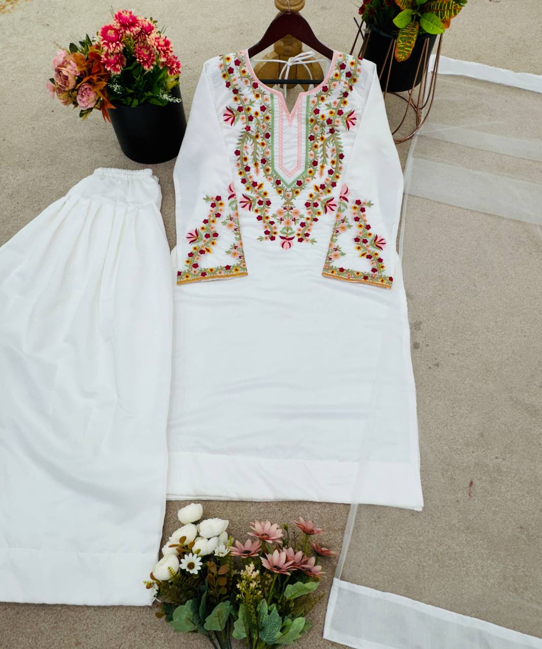 Mesmerizing White Color Pure Natural Crepe Silk With Embroidery Sequence Work Palazzo Suit