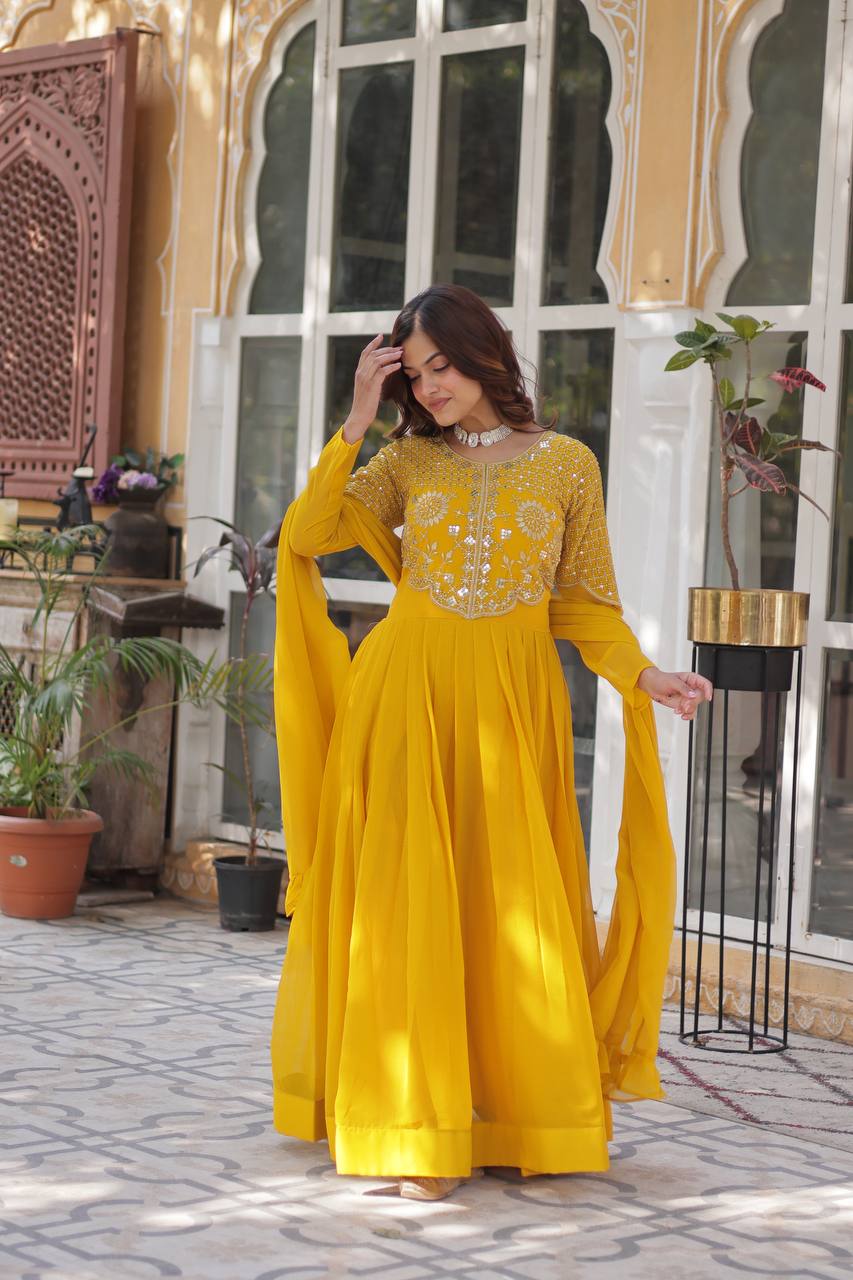Party Wear Yellow Color Faux Blooming Georgette With Attractive Embroidered Work Designer Gown