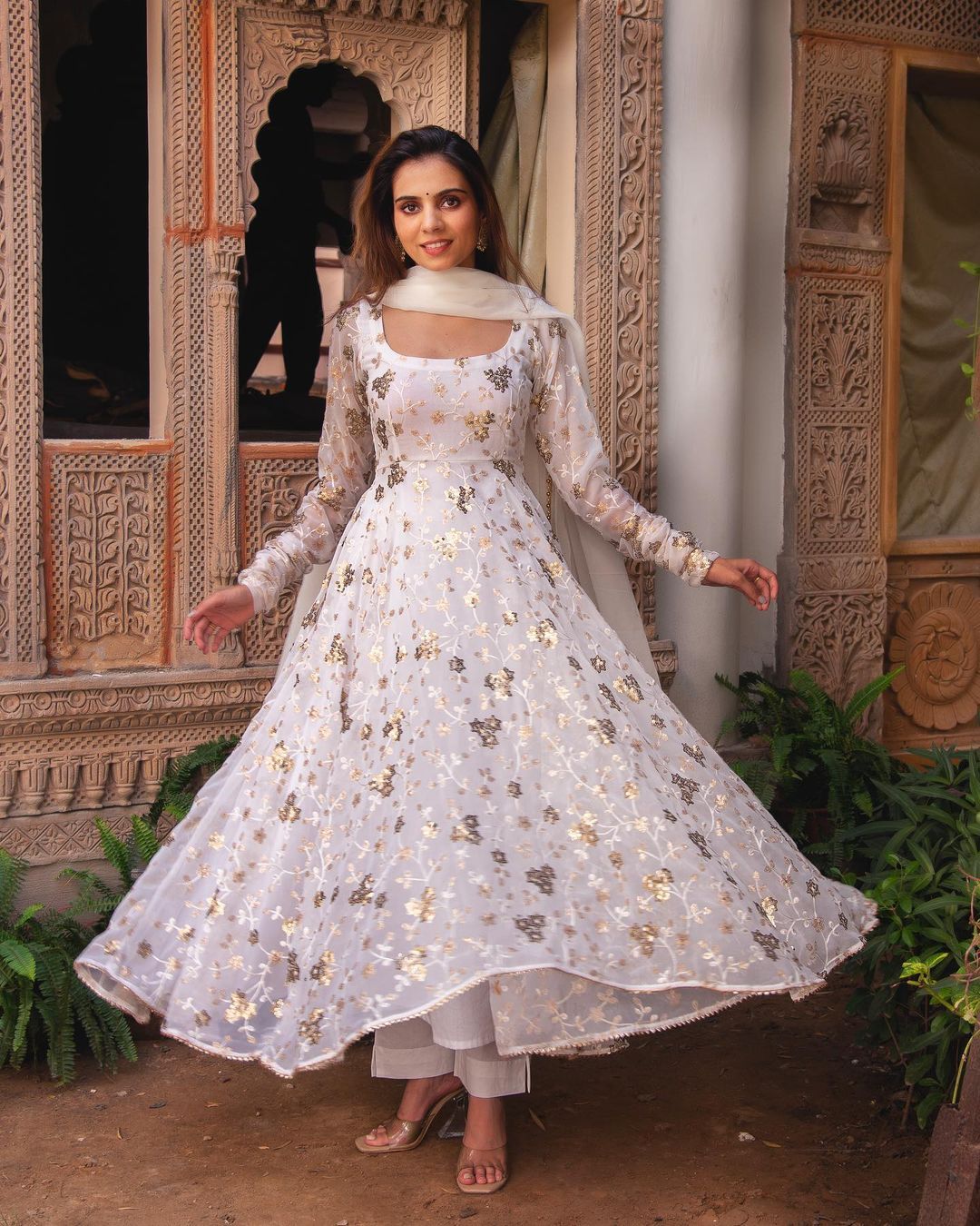 Admiring Embroidery Sequence Work White Color Gown