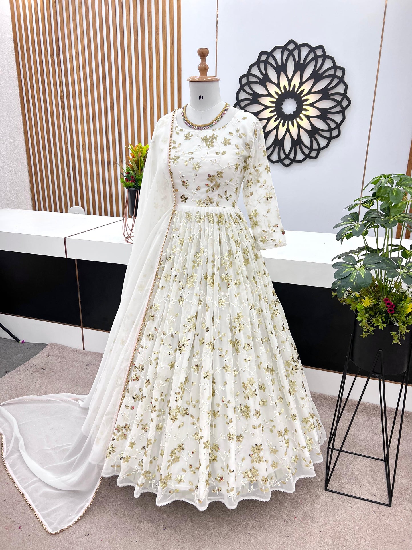Admiring Embroidery Sequence Work White Color Gown