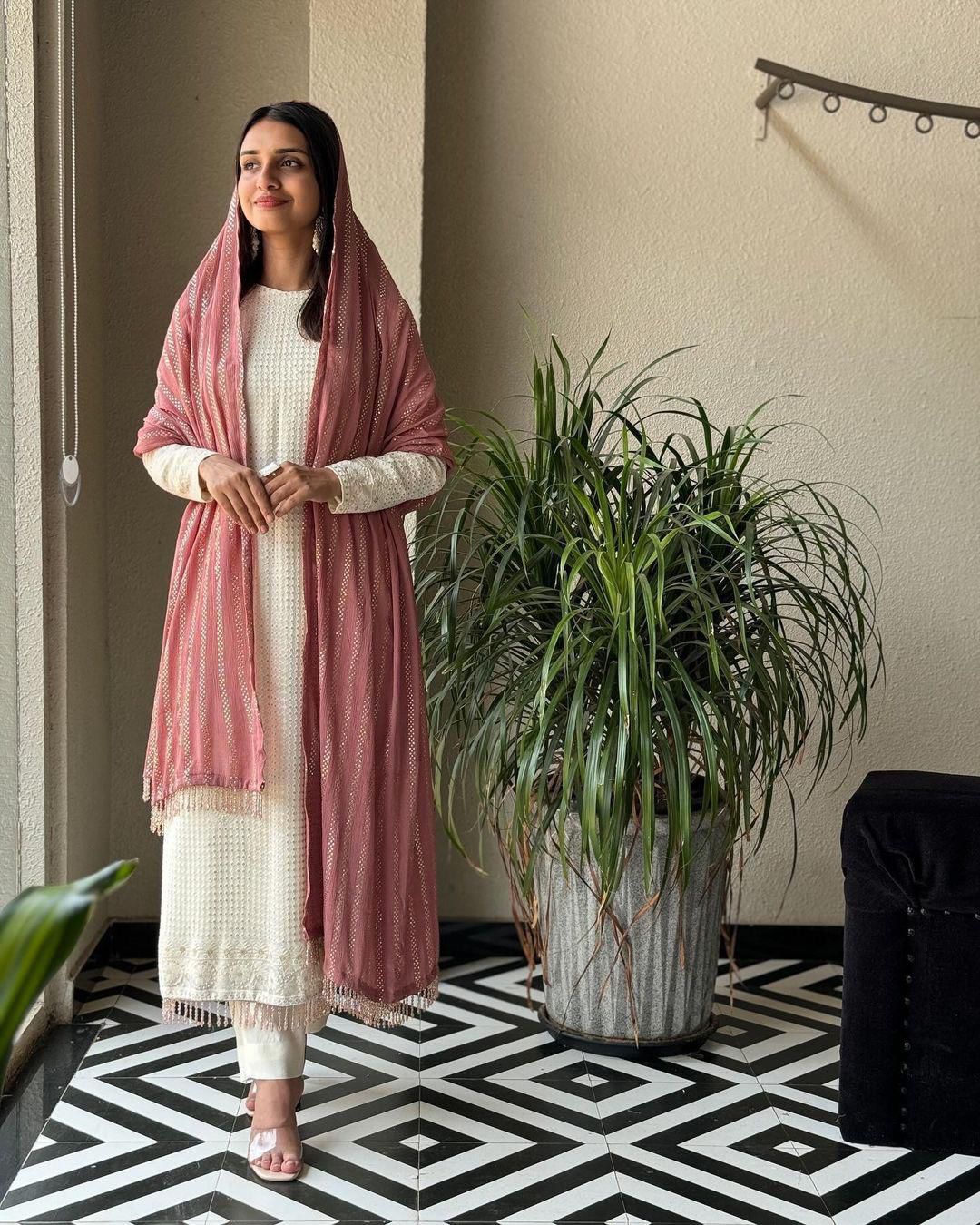 Attractive Faux Georgette Sequence Thread Embroidered Work White Color Salwar Suit