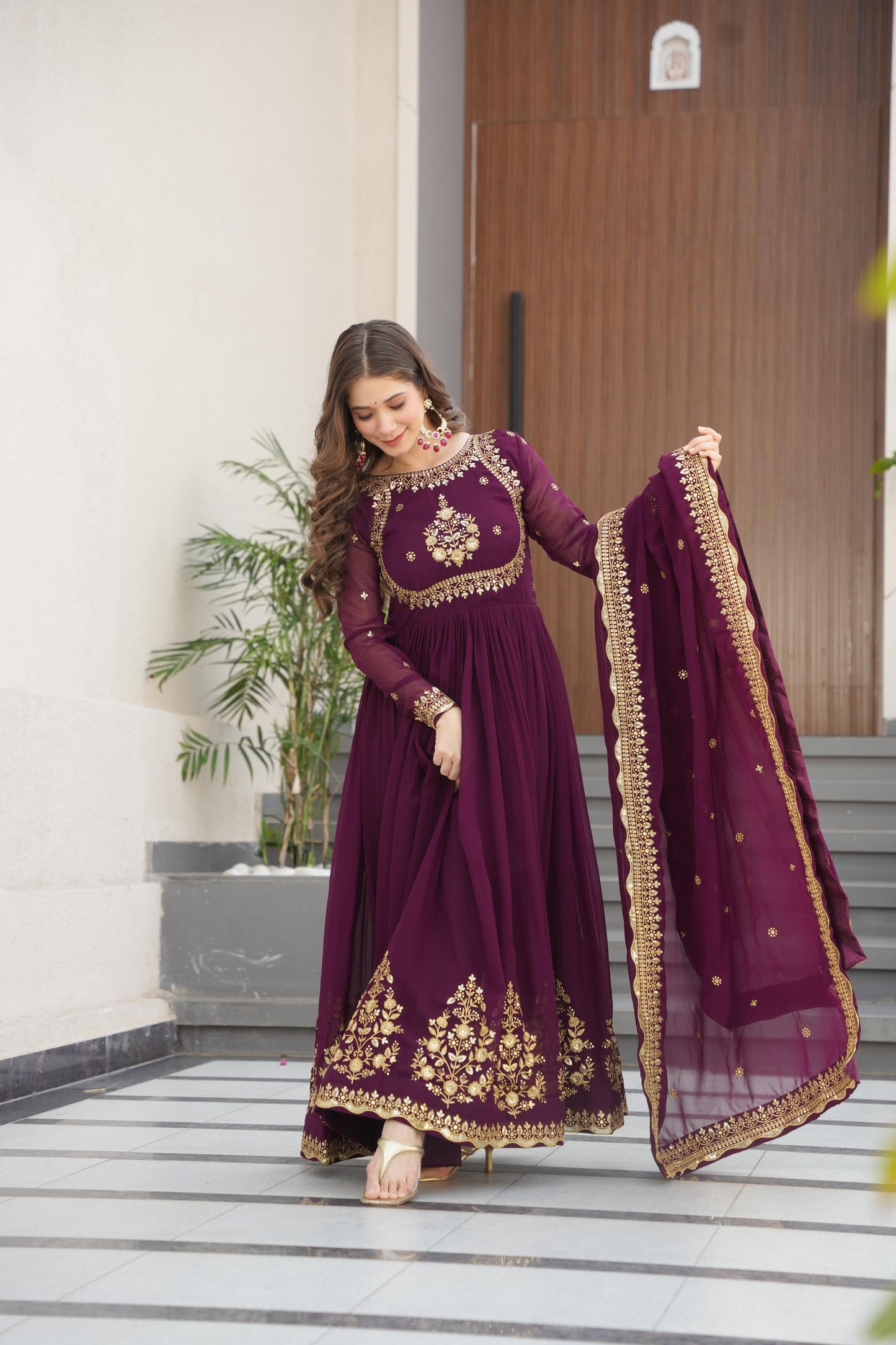 Outstanding Wine Color Faux Blooming Georgette With Zari Thread Sequins Embroidery Designer Gown