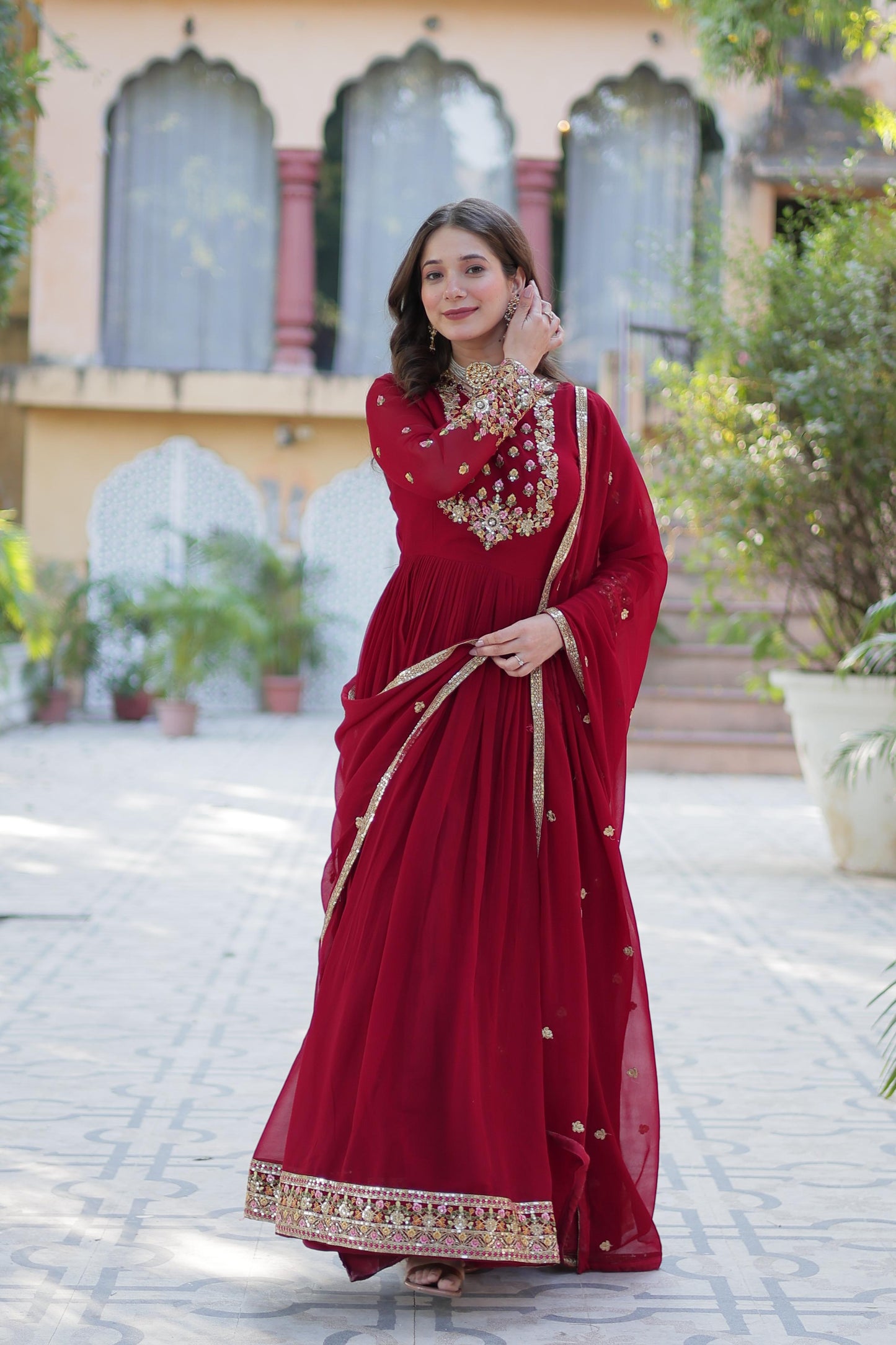 Attractive Maroon Color Faux Blooming Georgette With Rich Sequins Embroidered Work Designer Gown