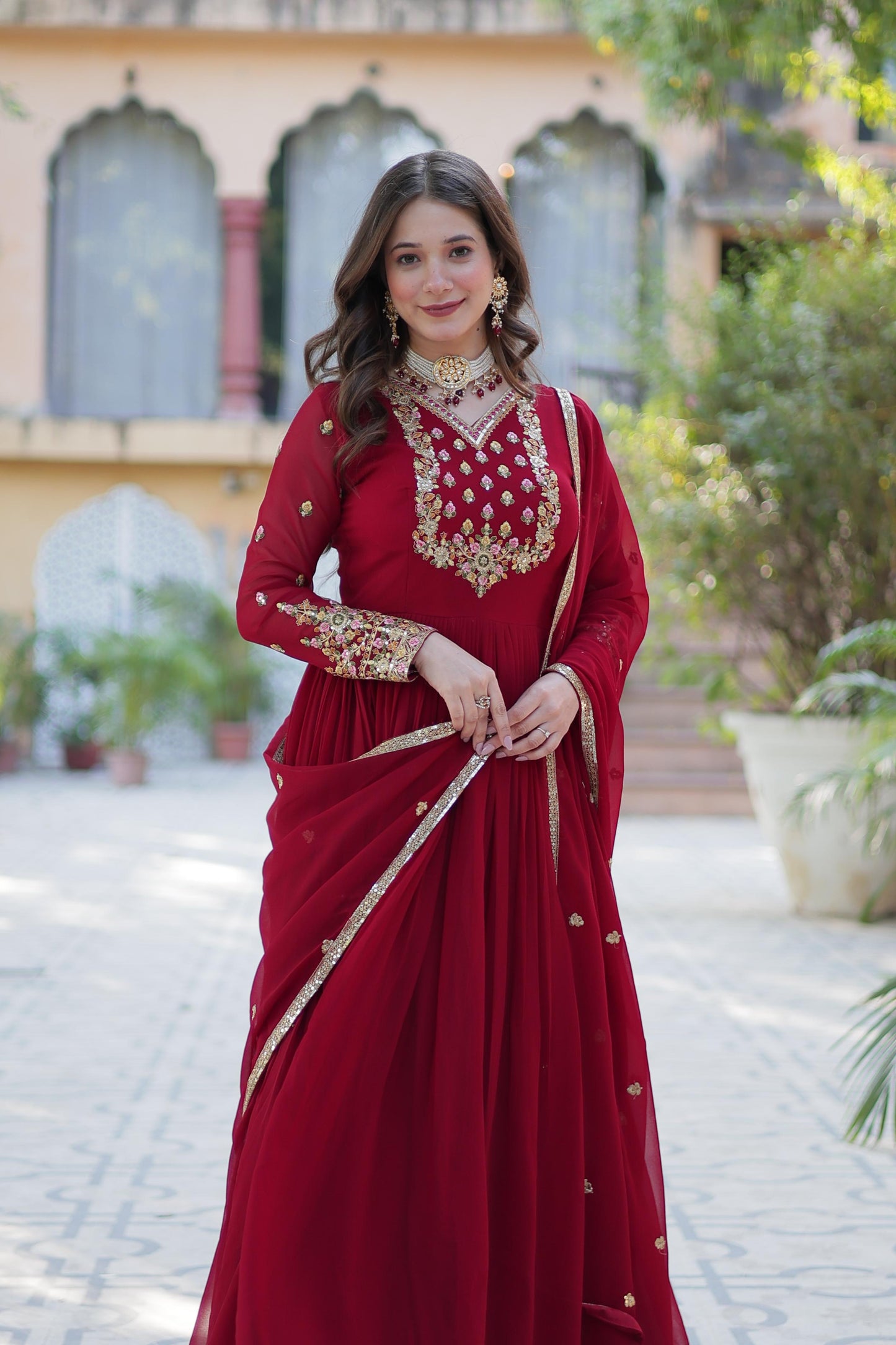 Attractive Maroon Color Faux Blooming Georgette With Rich Sequins Embroidered Work Designer Gown