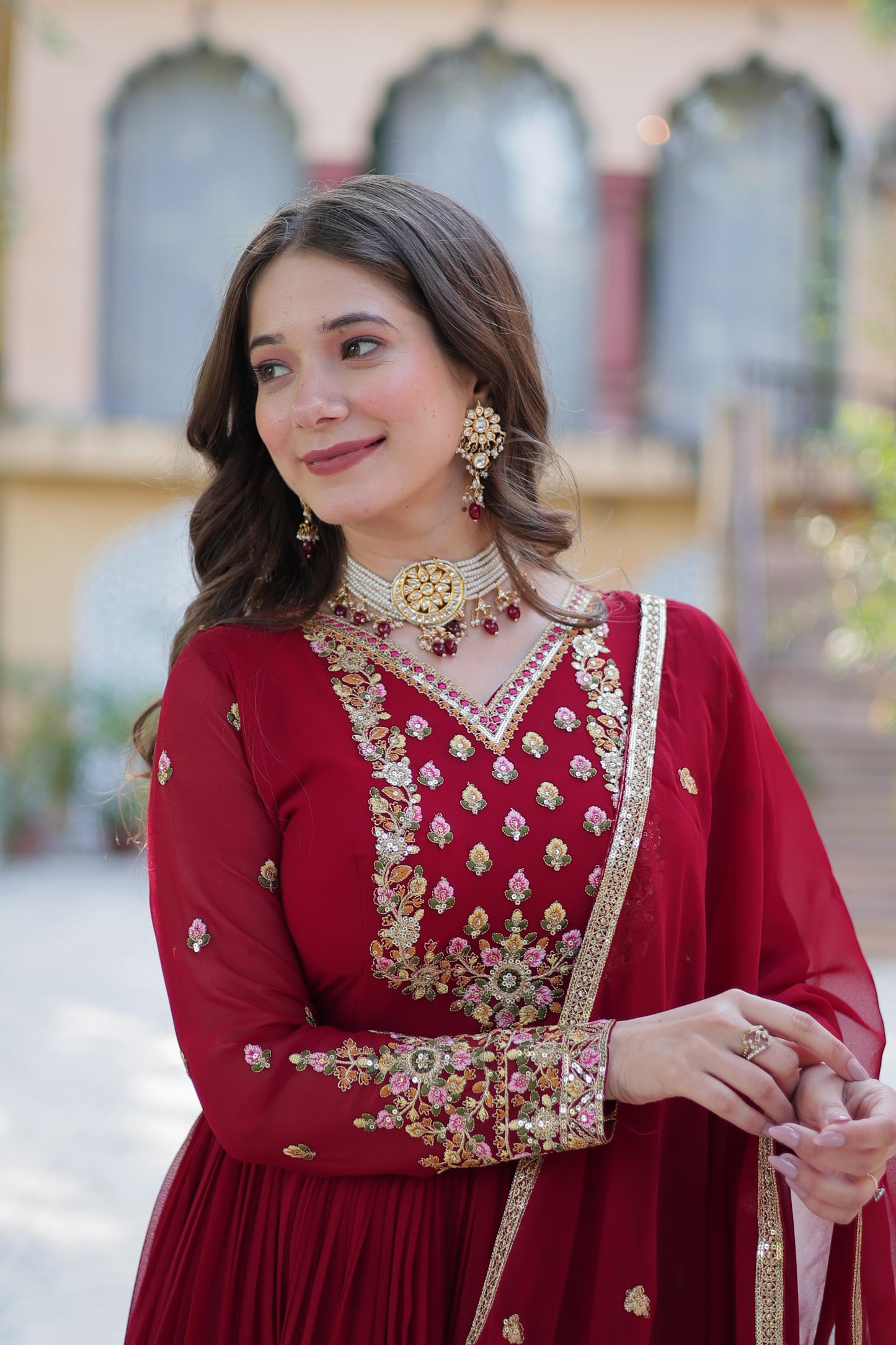 Attractive Maroon Color Faux Blooming Georgette With Rich Sequins Embroidered Work Designer Gown