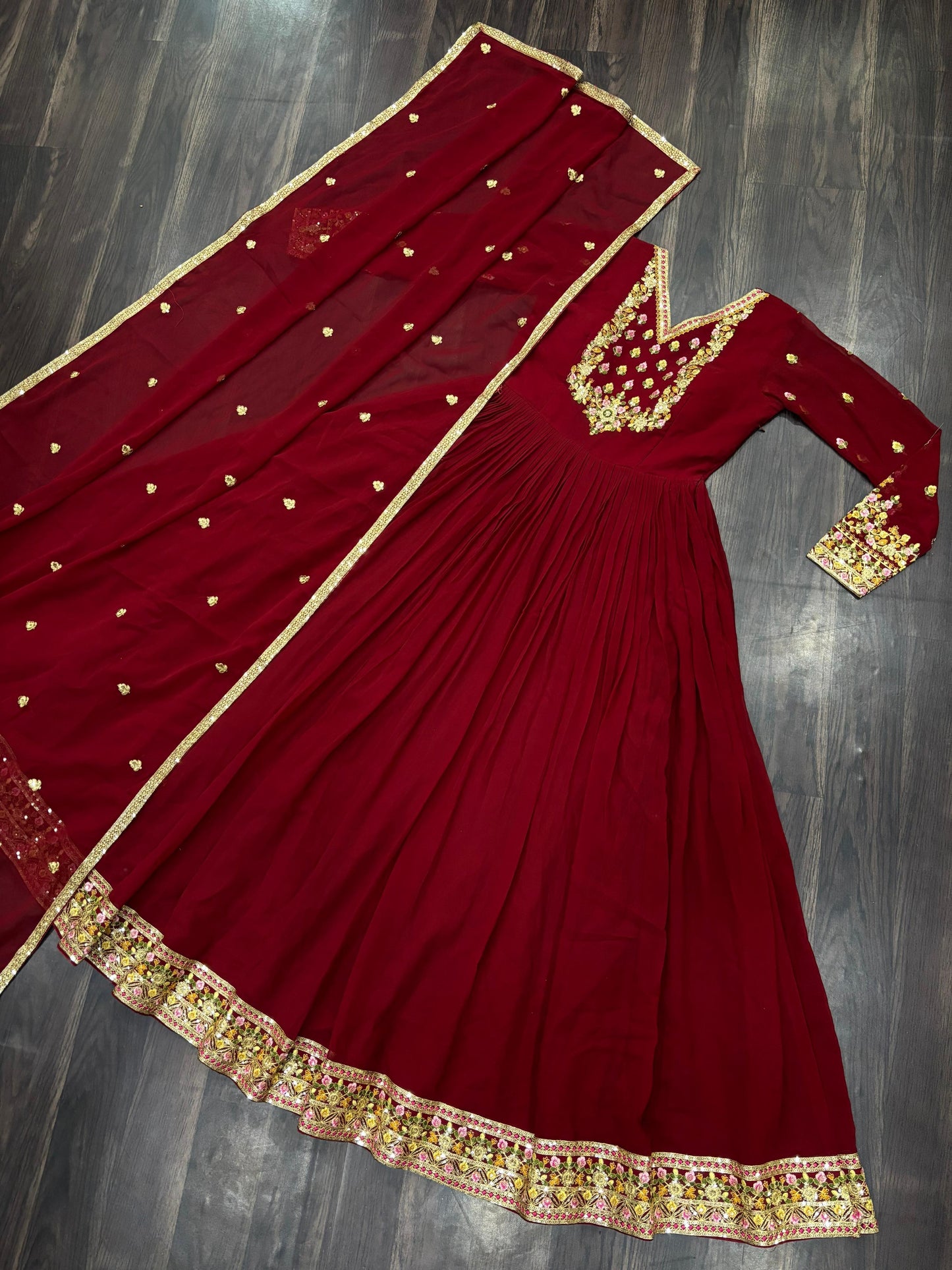 Attractive Maroon Color Faux Blooming Georgette With Rich Sequins Embroidered Work Designer Gown