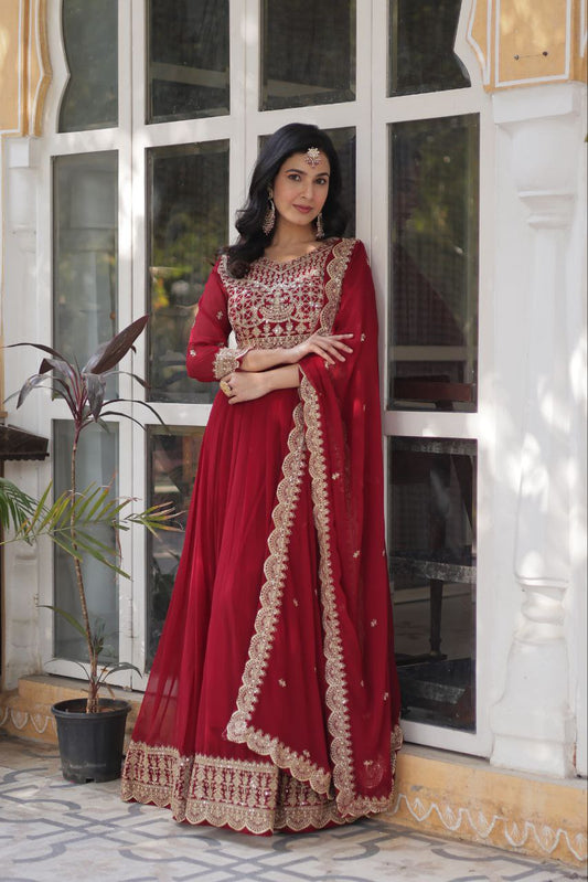 Party Wear Maroon Color Faux Blooming With Embroidery Zari Sequins Work Designer Gown