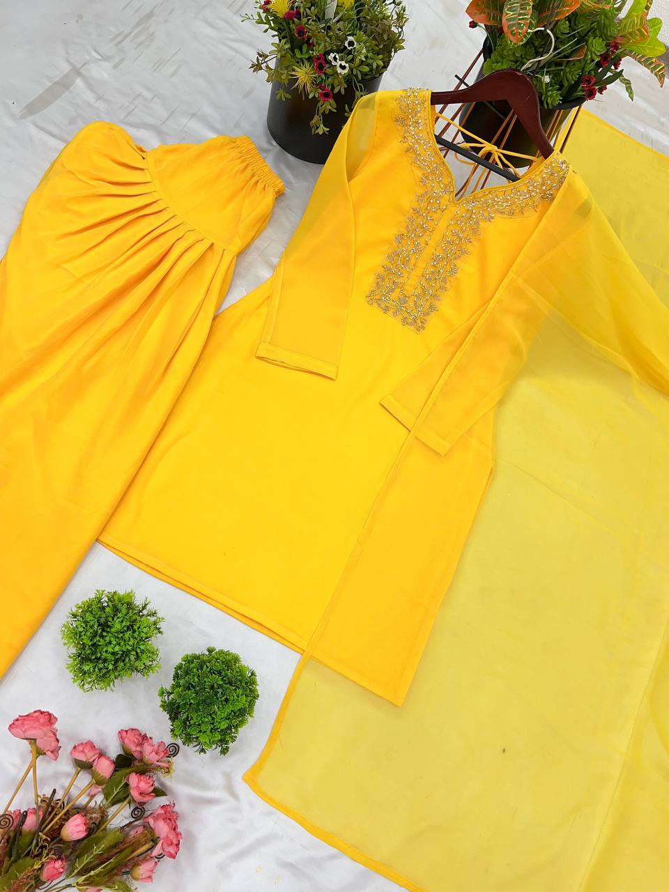 Stylish Yellow Color Faux Georgette And Embroidery With Hand work And Beads Salwar Suit