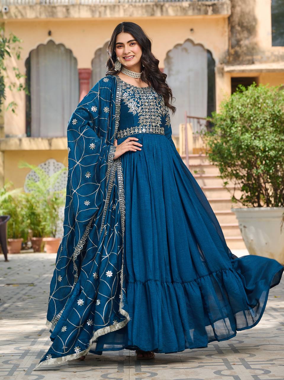 Captivating Teal Blue Color Pure Vichitra Silk And Sequence Embroidery Work Gown
