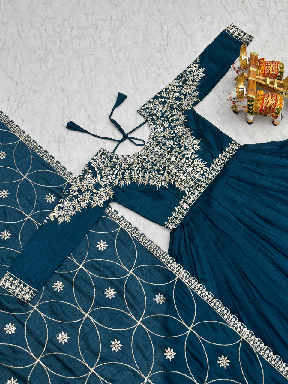 Captivating Teal Blue Color Pure Vichitra Silk And Sequence Embroidery Work Gown