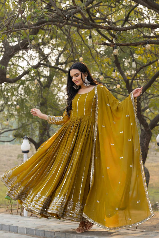Gorgeous Mahendi Green Color Faux Georgette With Sequence Embroidery Work Beautiful Gown