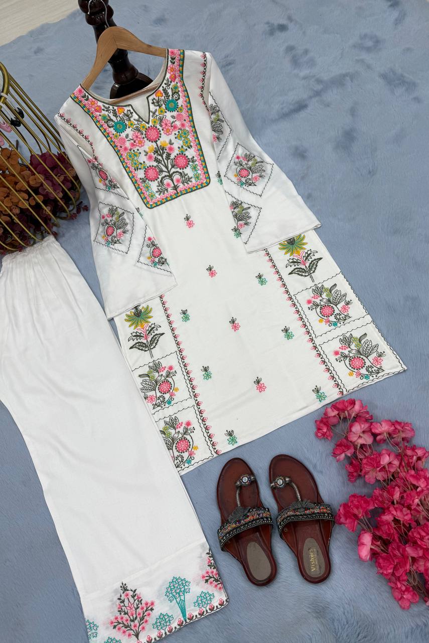 Presenting White Color Heavy Rayon Silk With Heavy Embroidery Work Palazzo Suit