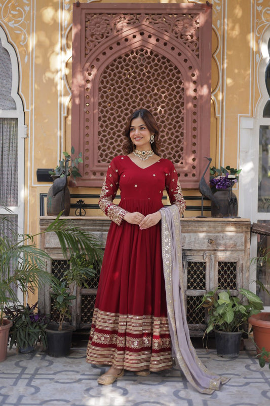 Captivating Maroon Color Faux Blooming With Embroidery Zari Sequins Work Designer Gown