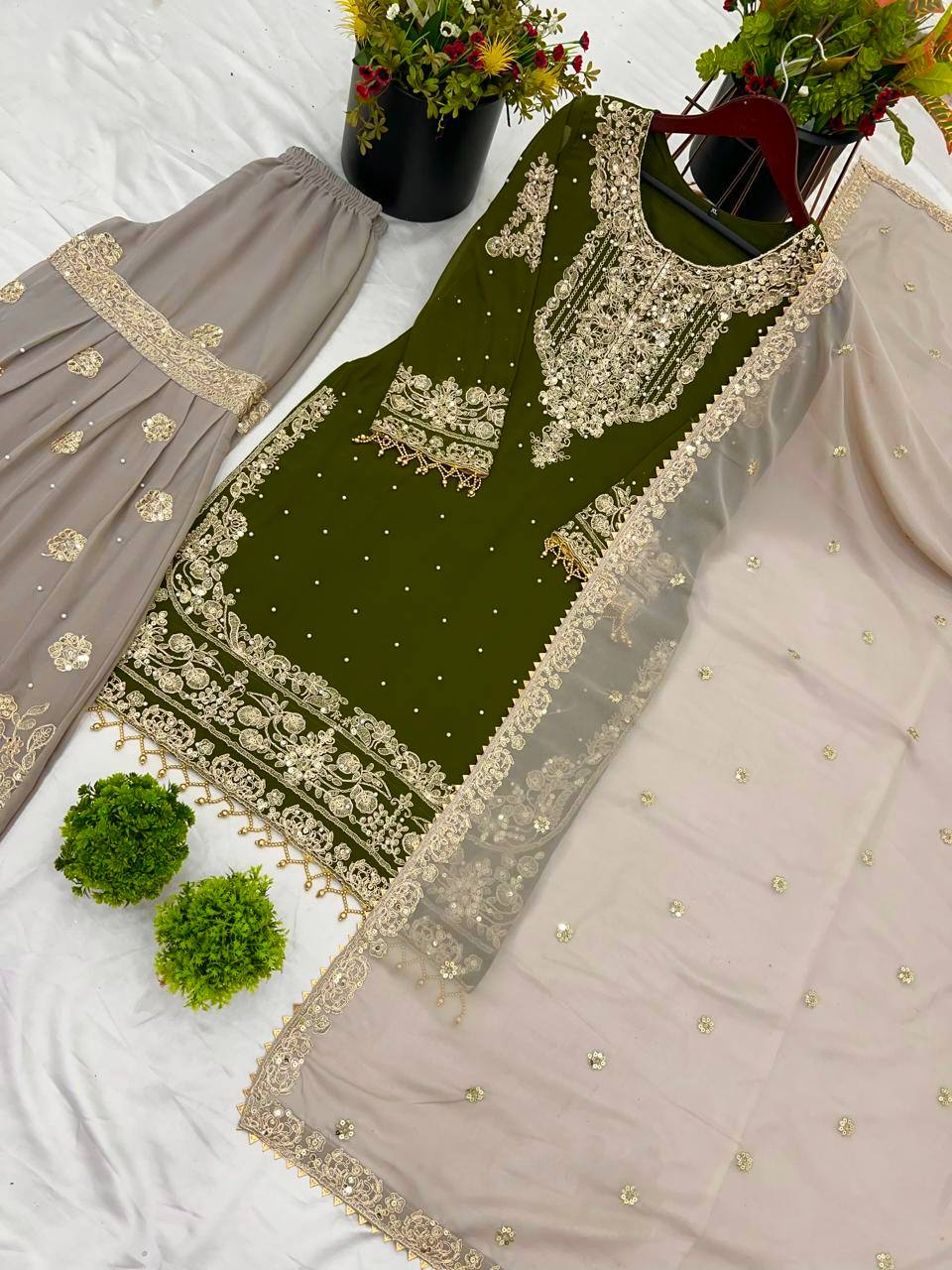 Occasion Wear Green Color Heavy Faux Georgette With Heavy Embroidery Work Palazzo Suit