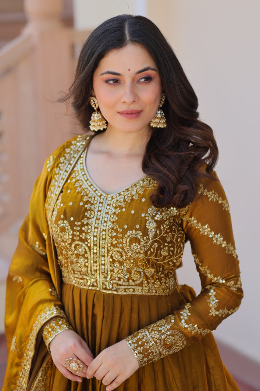 Festive Wear Mahendi Color Zari And Sequins Embroidered Work Designer Gown