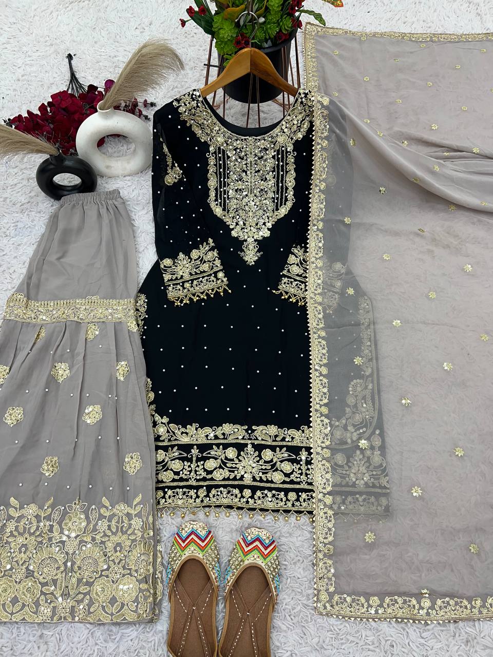 Occasion Wear Black Color Heavy Faux Georgette With Heavy Embroidery Work Palazzo Suit